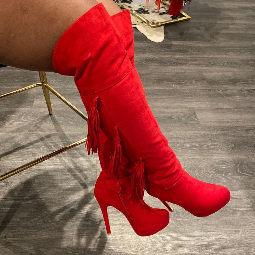 JustFab over the knee platform boots with tassels. Regular calf
